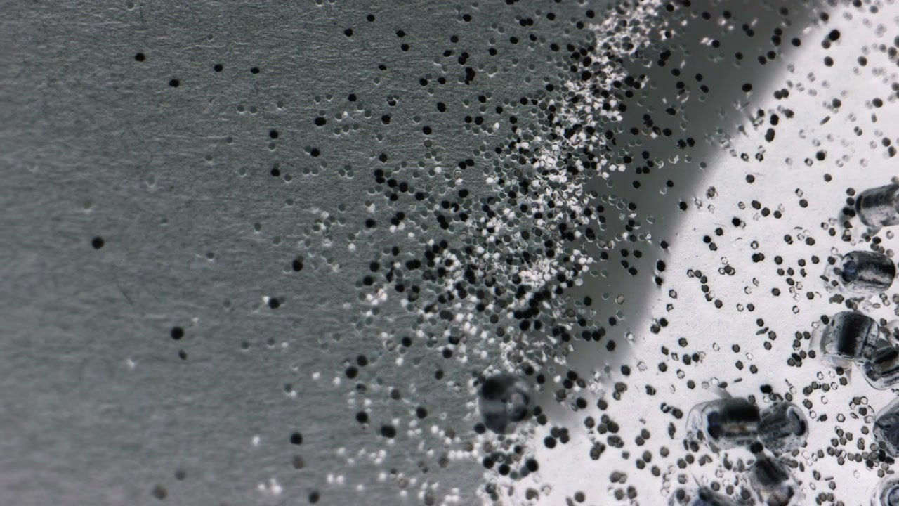 Glitter Particles Swirling on an Abstract Surface