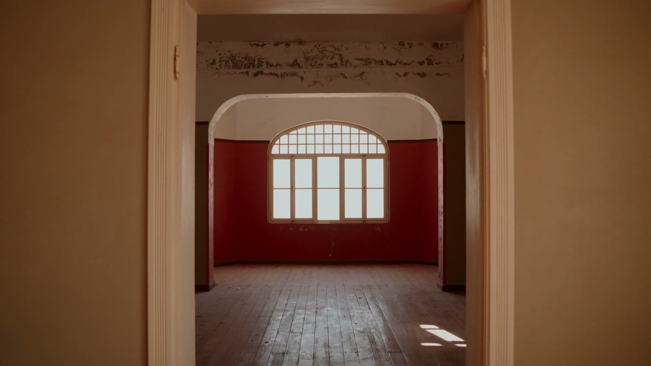 Abandoned Room With Arched Window