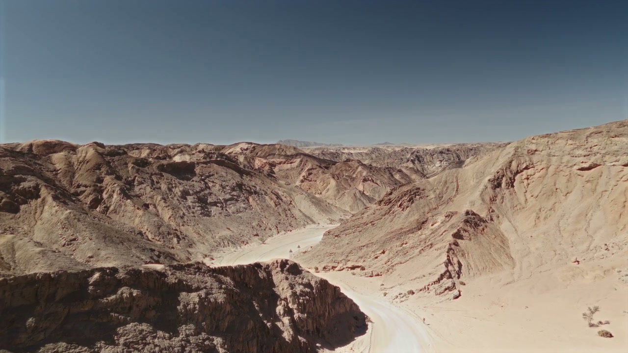 Vast Desert Landscape with Winding Road