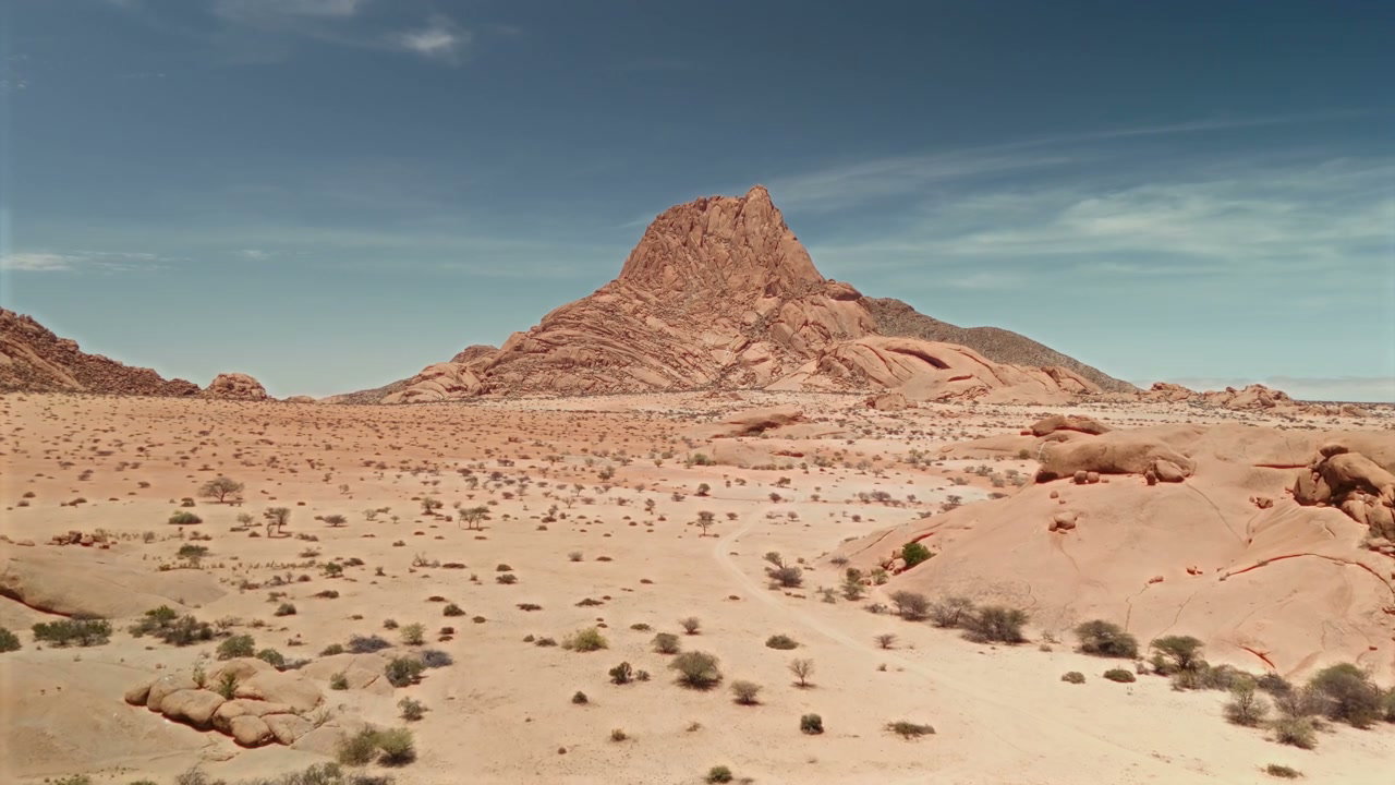 Vast Desert Landscape with Mountains