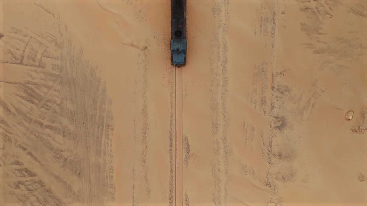Cargo Train Crossing Sandy Desert