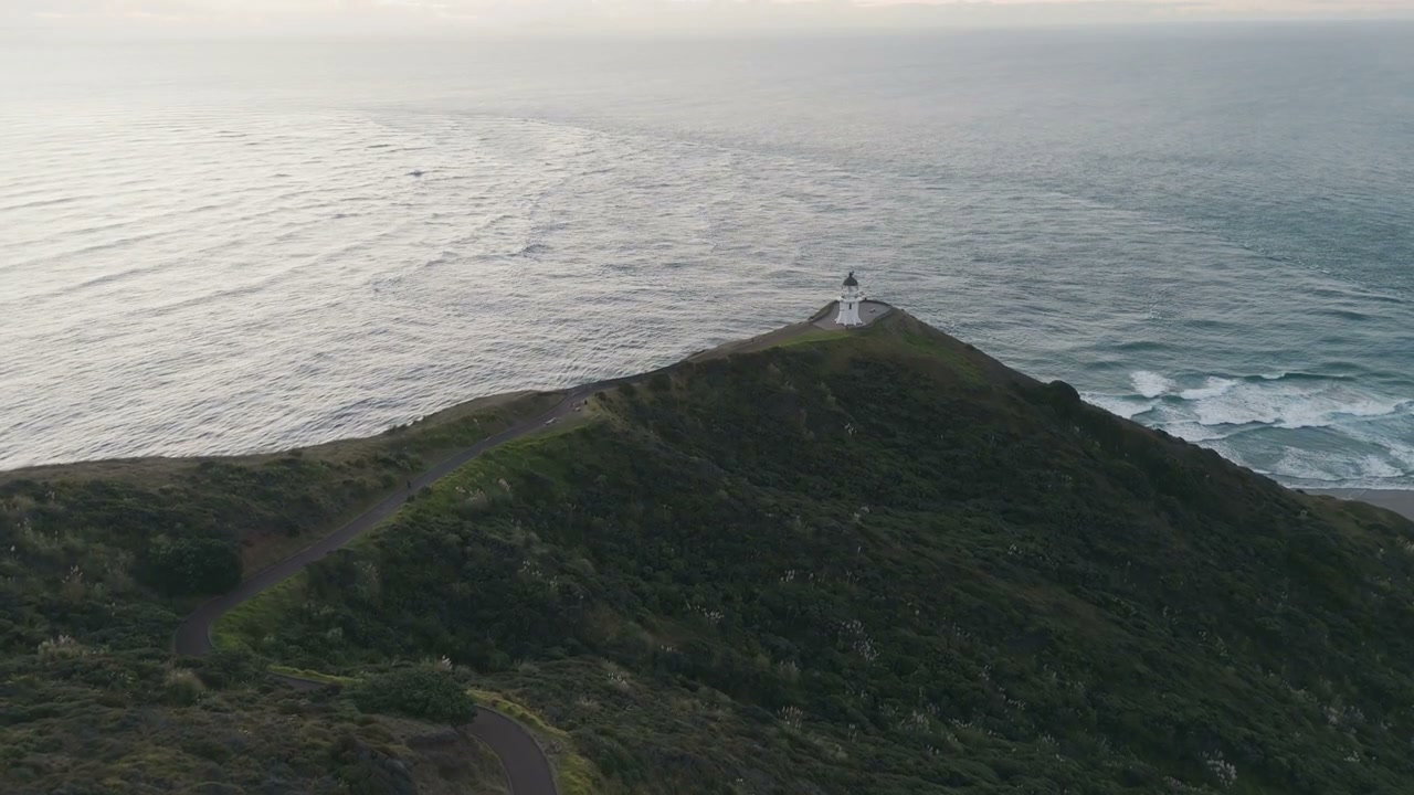 Lighthouse on Coastal Hillside in New Zealand