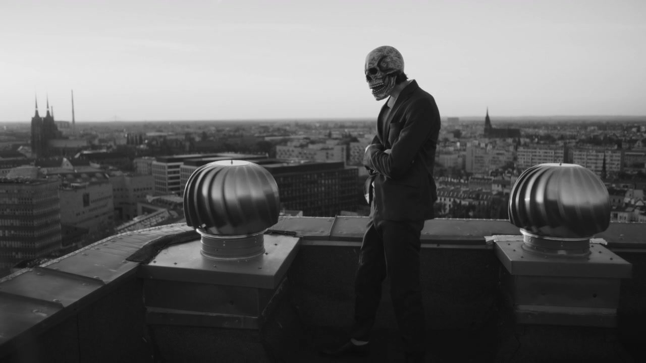 Man in Skeleton Mask on Rooftop
