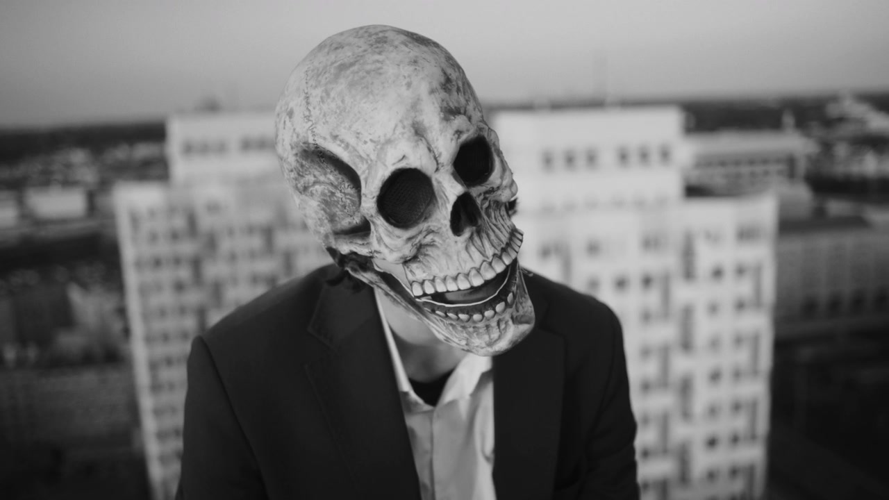Skull Mask Person on Rooftop