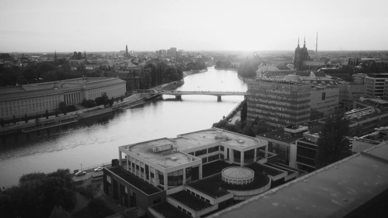 City Skyline View with River at Sunset