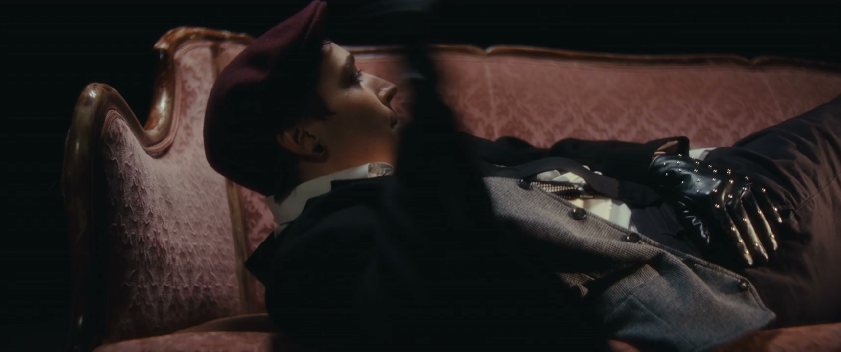 Mime Performer Dancing on Vintage Sofa
