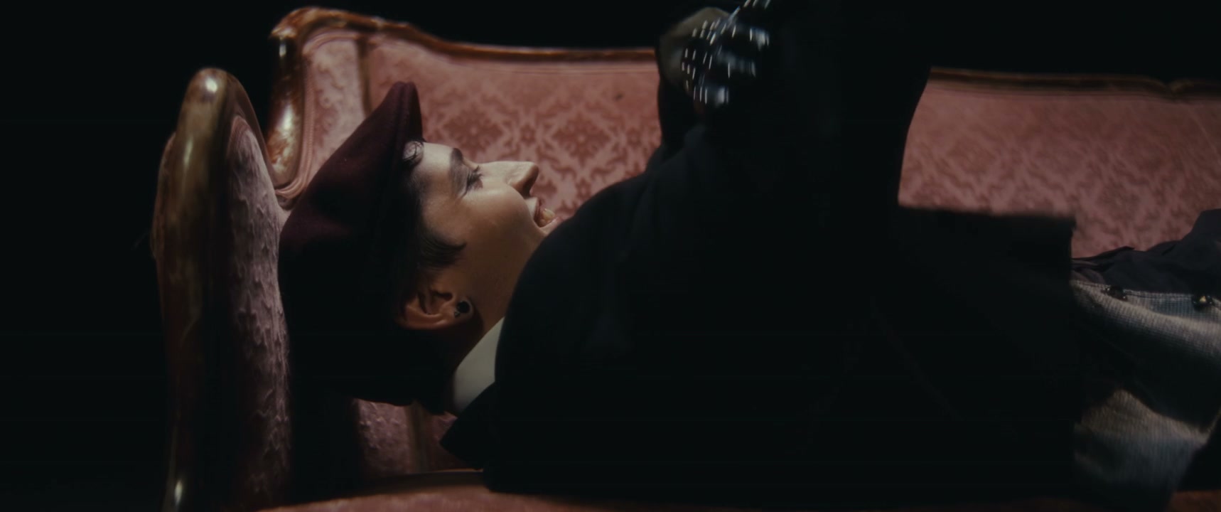 Mime Artist on Vintage Sofa