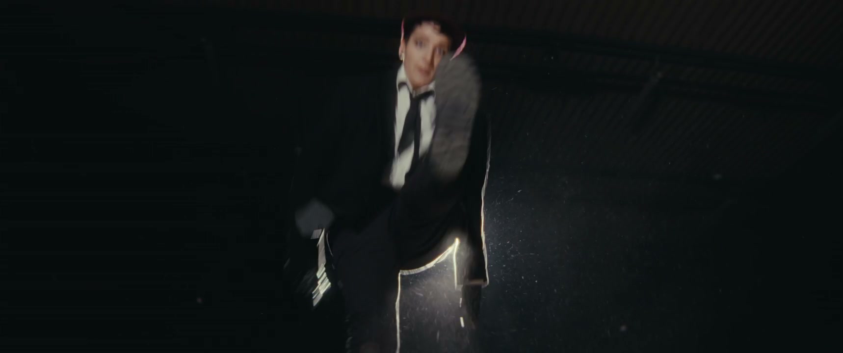 Stylish Dancer Performing in Spotlight