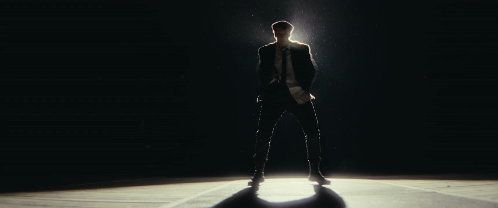 Mime Performer Dancing Under Spotlight