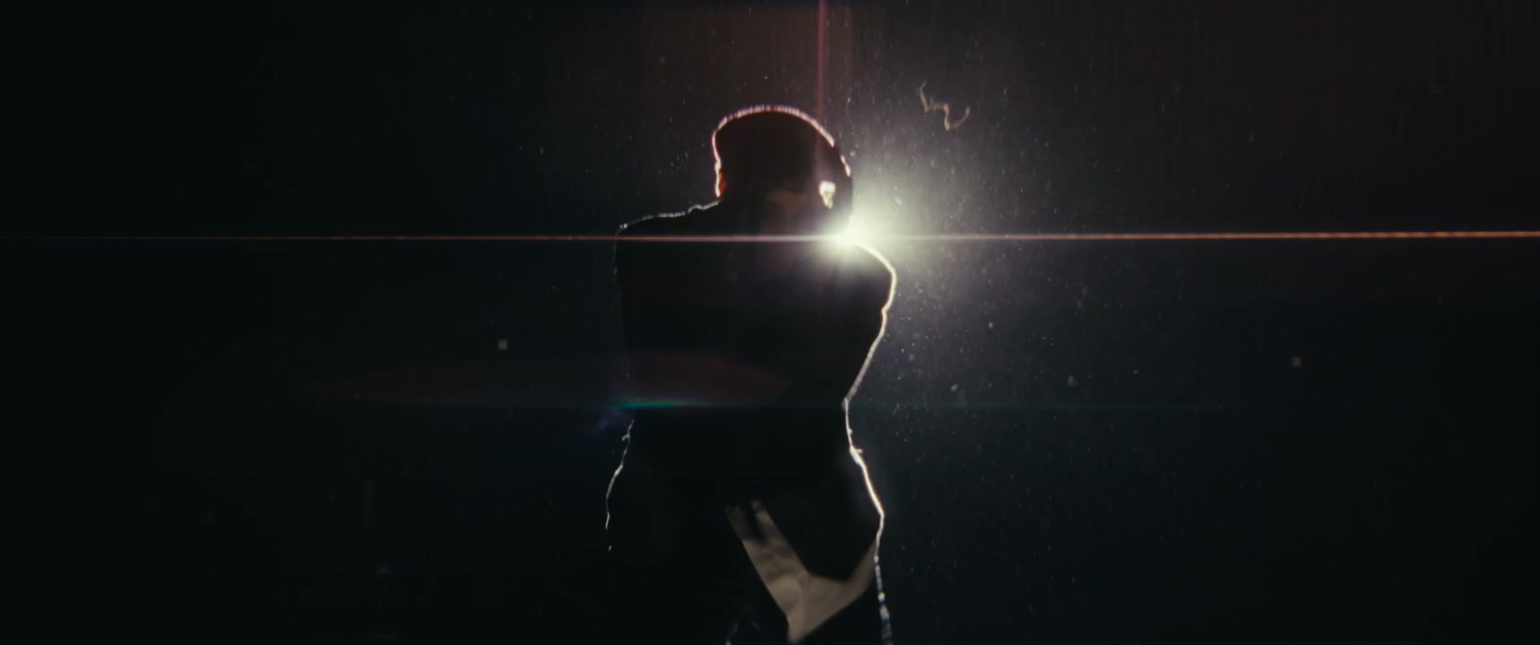 Mime Dancer in Spotlight with Lens Flare