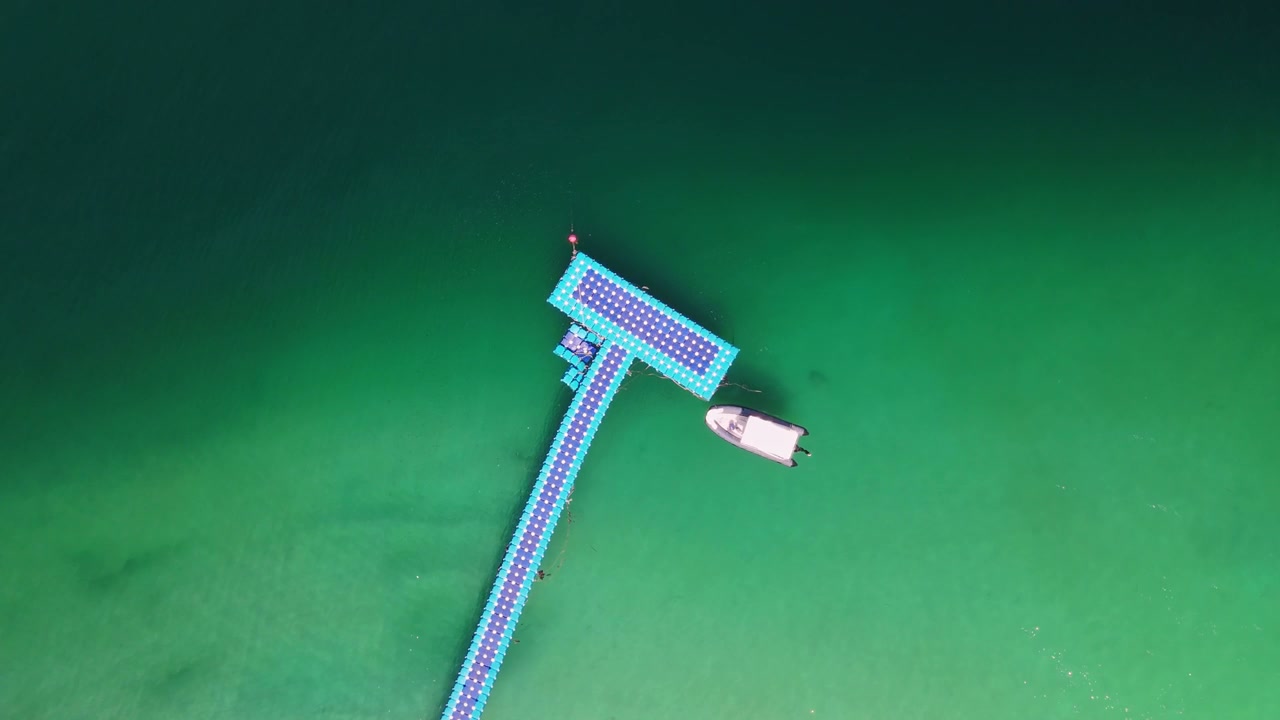 Floating Pier and Boat in Tropical Sea