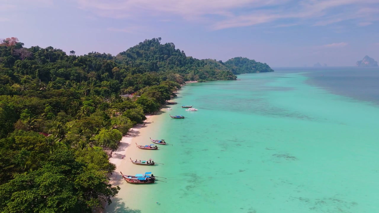 Tropical Island Beach and Longtail Boats