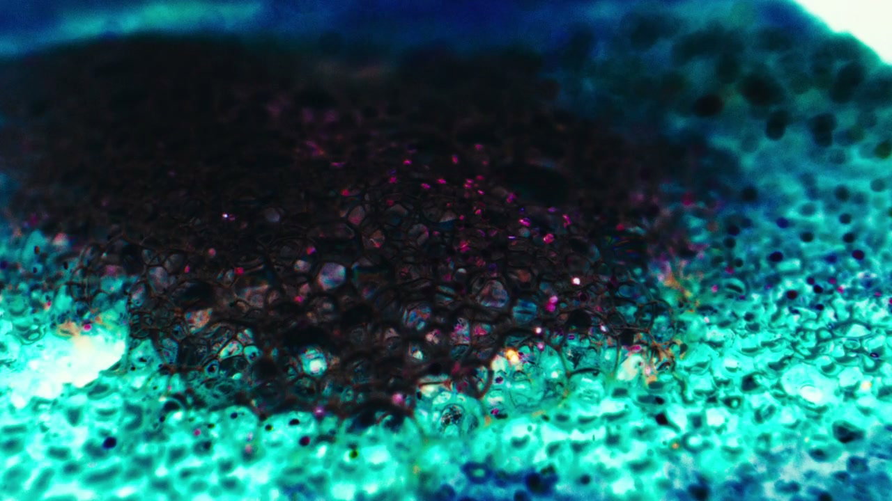 Abstract Dark Bubbles on Cyan Liquid
