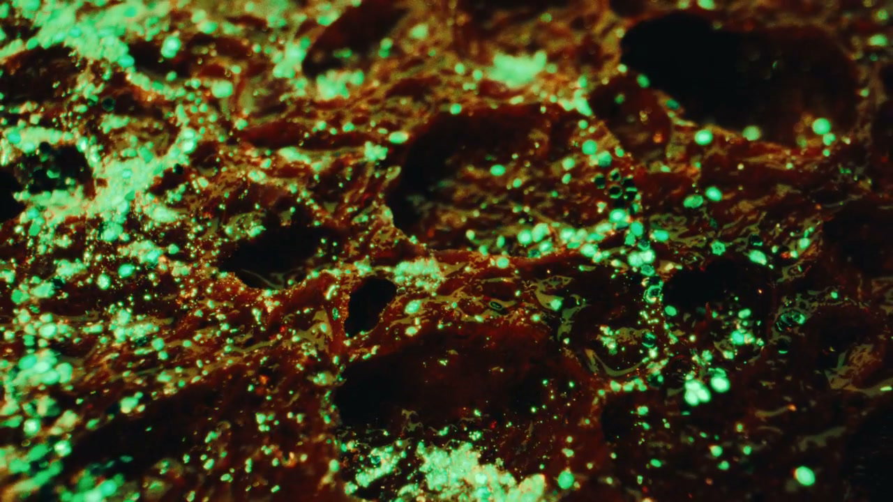 Toxic Mass With Green Glowing Particles