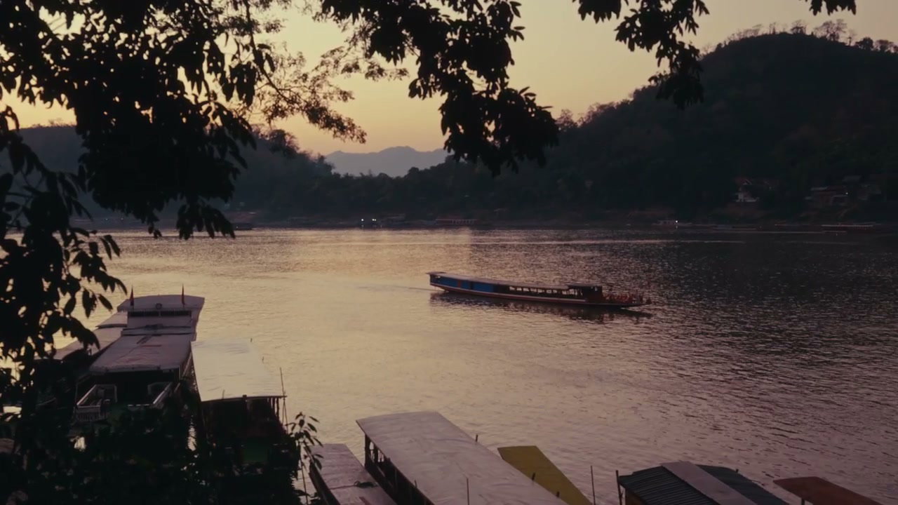 Boat on Mekong River at Sunset