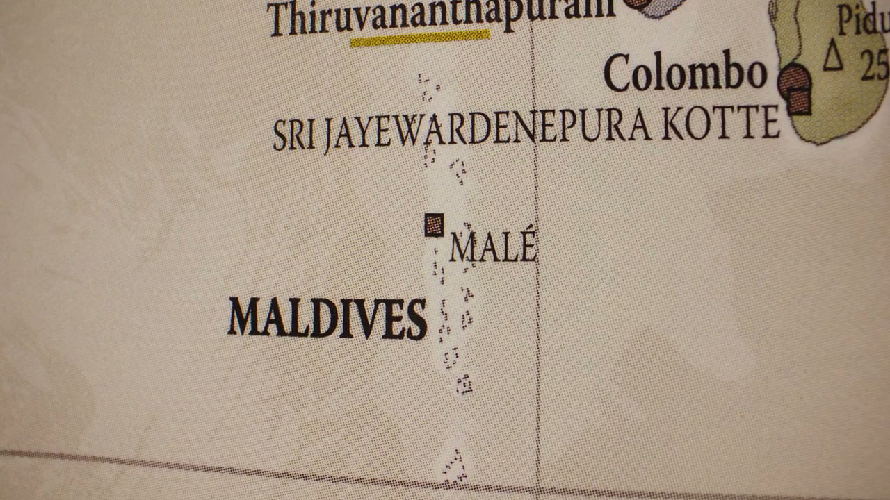Close-Up Pan on Maldives and Indian Ocean Map