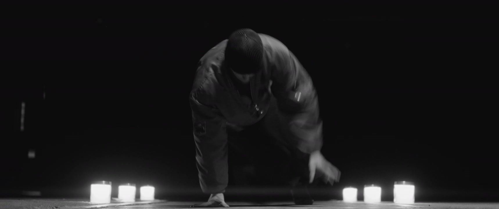 Breakdancer Performing on Dark Stage
