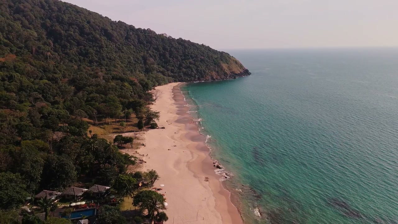 Tropical Beach and Green Hills in Thailand