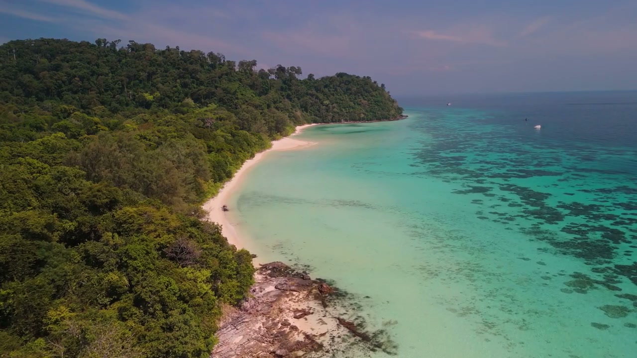Tropical Island Beach and Turquoise Sea