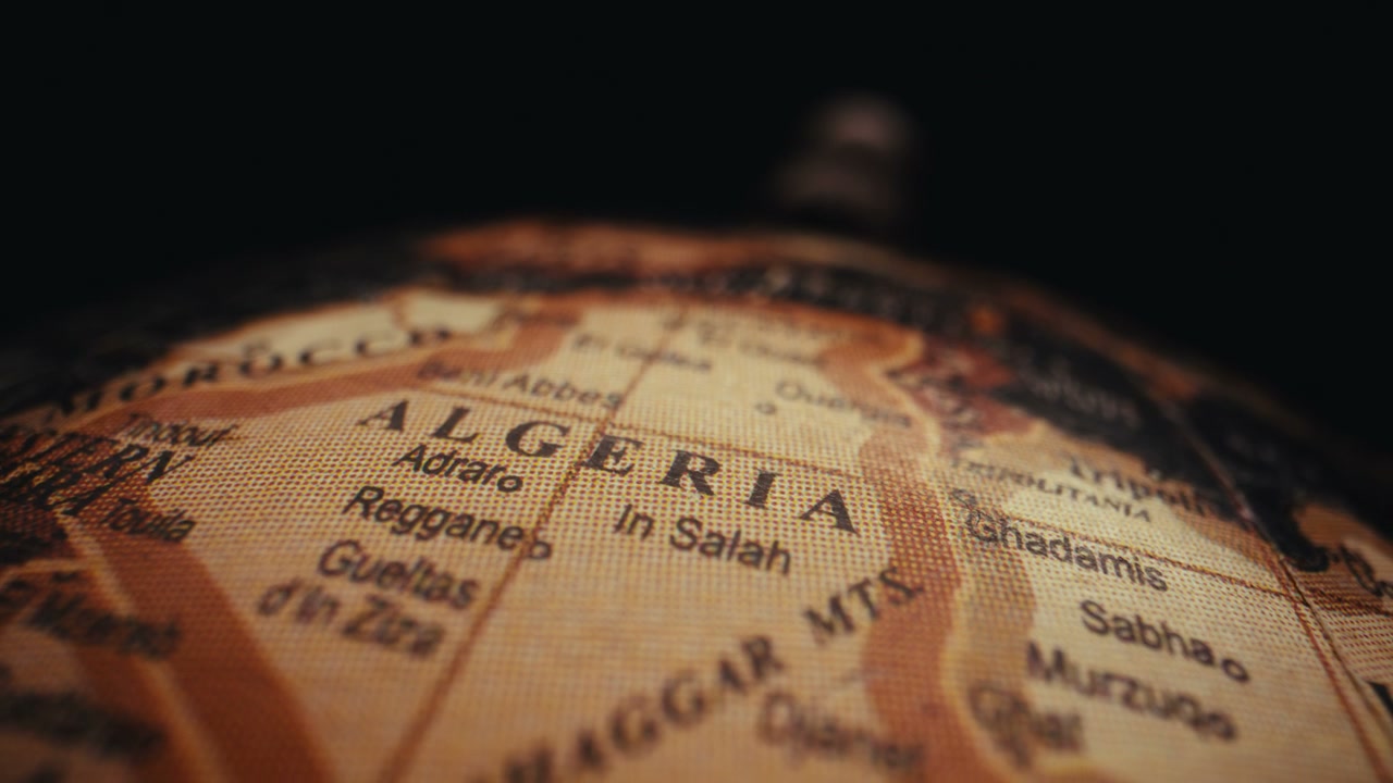 Vintage Globe Close Up on Algeria Map