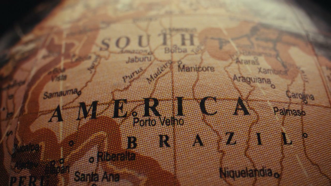 Close Up Of Vintage Globe Rotating On South America