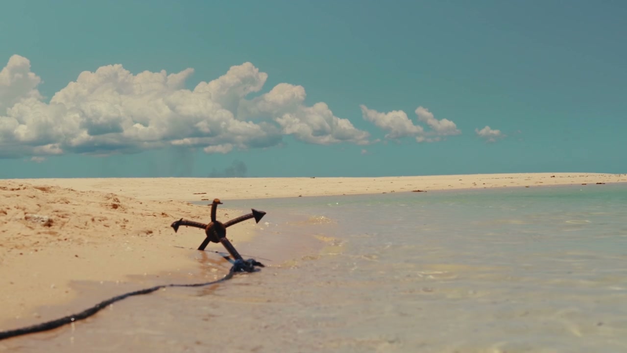 Anchor on Tropical Beach Shoreline