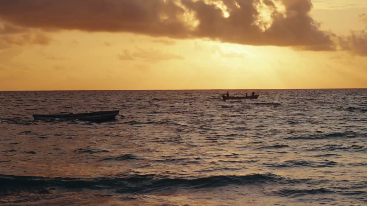 Fishing Boats on Ocean at Golden Sunset