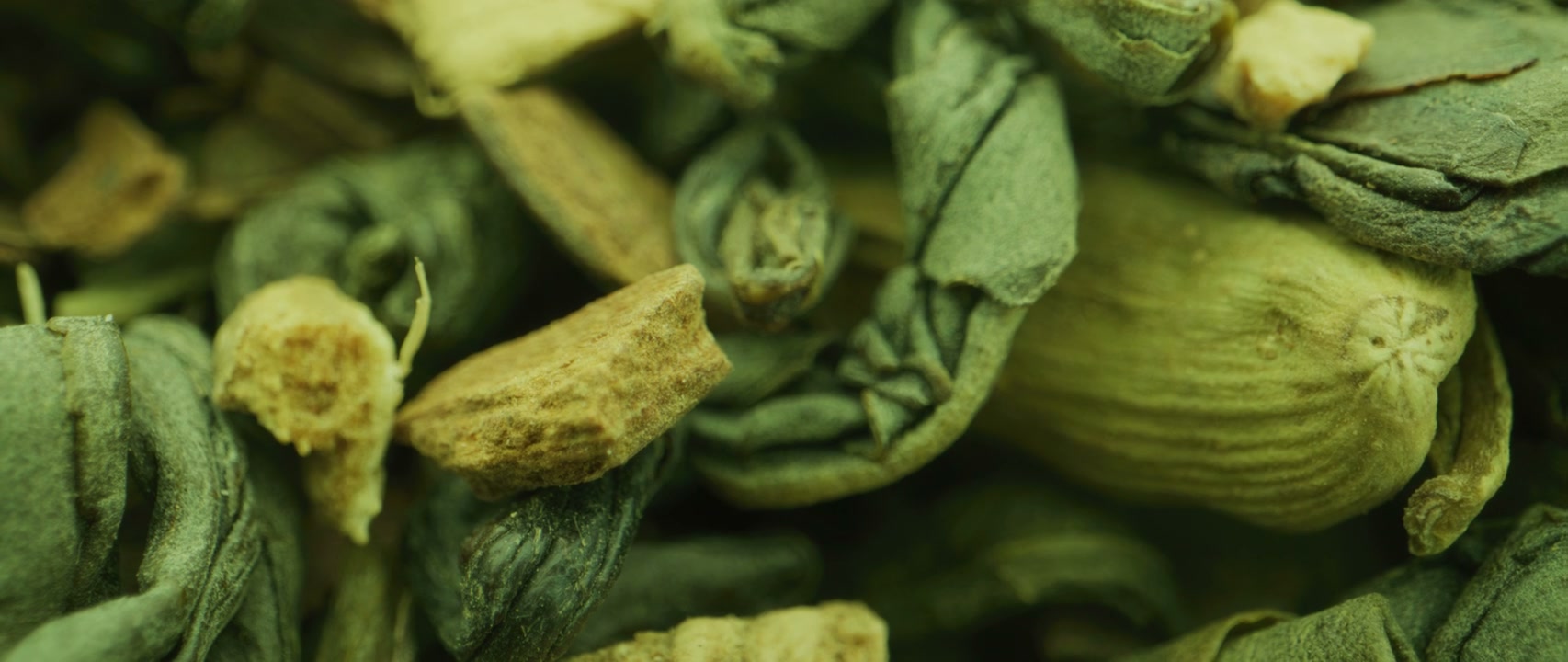 Green Tea Leaves and Spices Close-Up