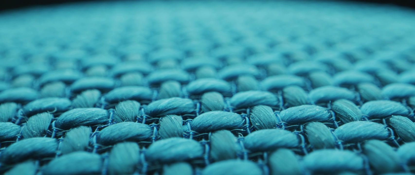 Macro Shot of Teal Fabric Weave