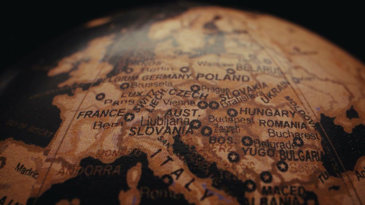 Vintage Globe Rotating Across European Map