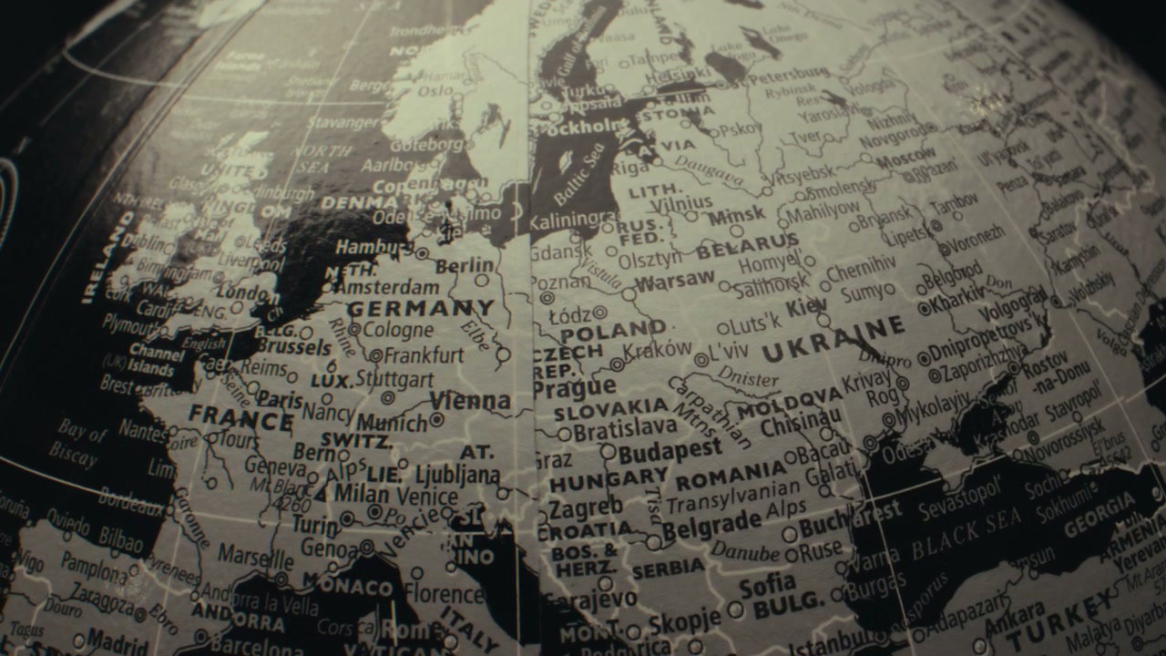 Vintage World Globe Rotating Over Europe