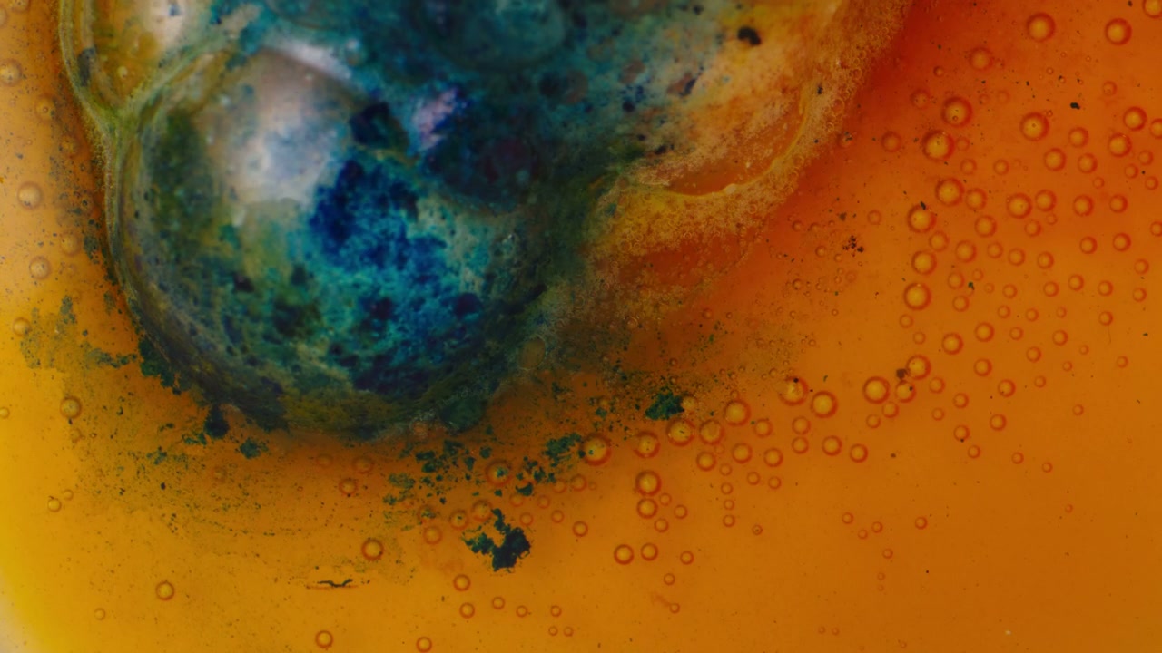 Vibrant Blue and Orange Liquid Reaction