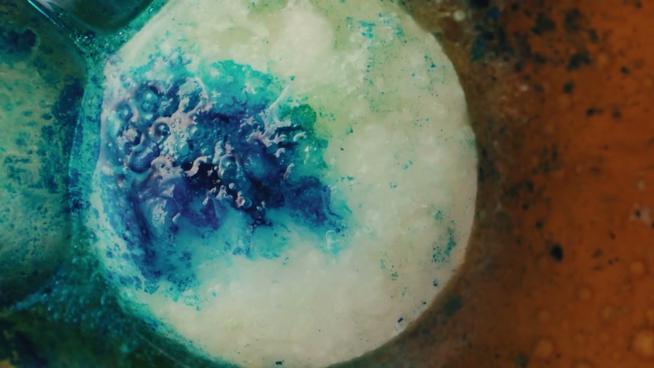 Colorful Tablet Dissolving in Liquid