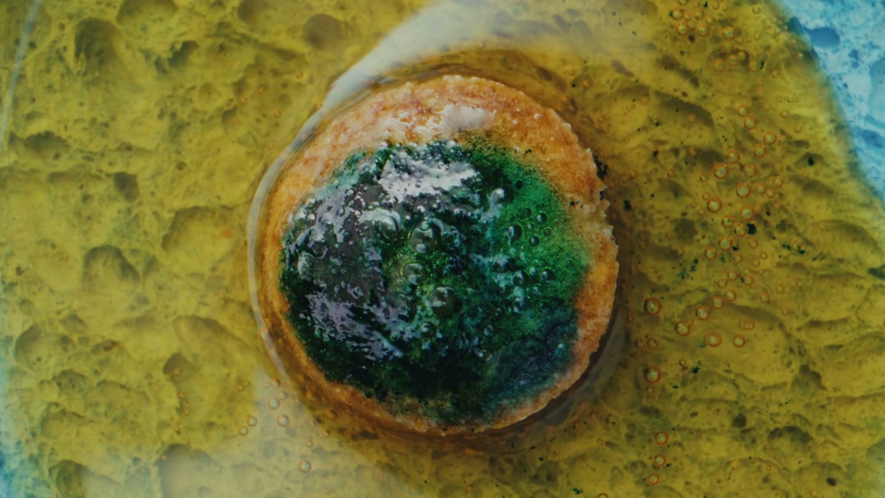Effervescent Pill in Yellow Liquid