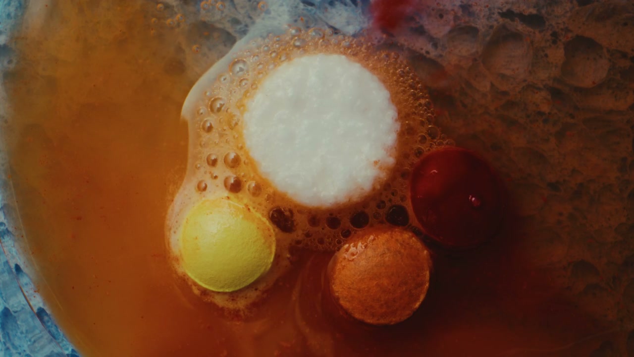 Colorful Effervescent Tablets Dissolve in Water