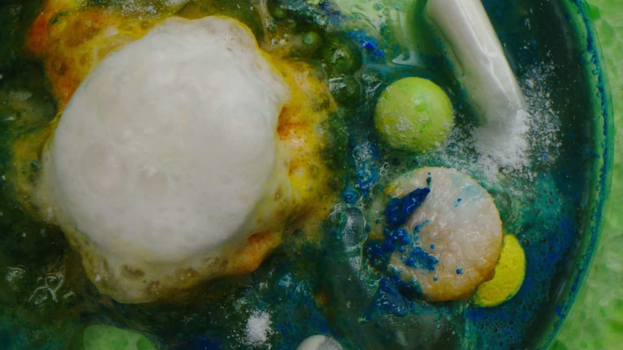 Colorful Chemical Reaction With Bubbling Foam