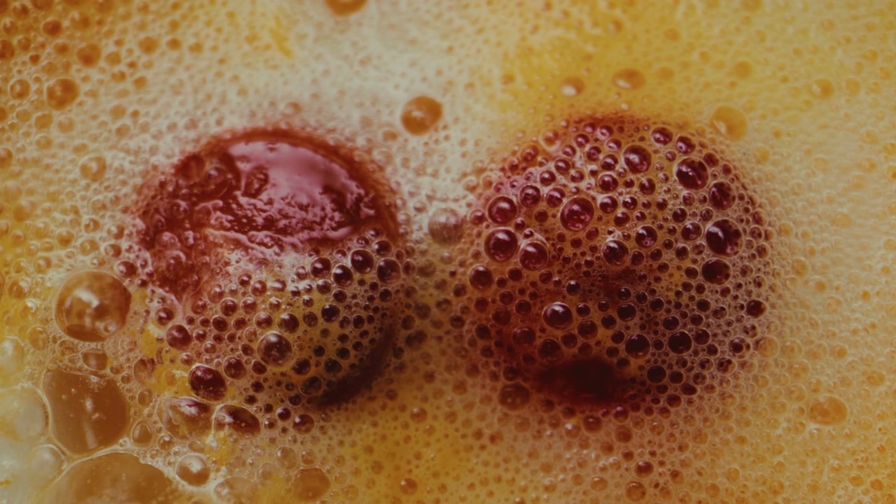 Abstract Bubbling Orange and Red Liquid