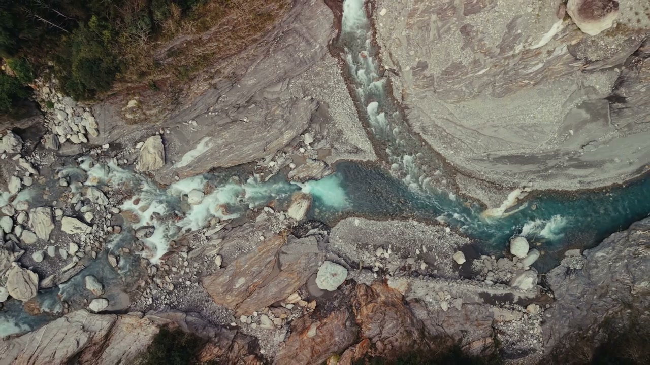 Aerial View of River Flowing Through Gorge