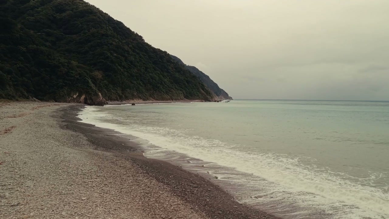 Taiwan Coastline with Pebble Beach and Ocean Waves