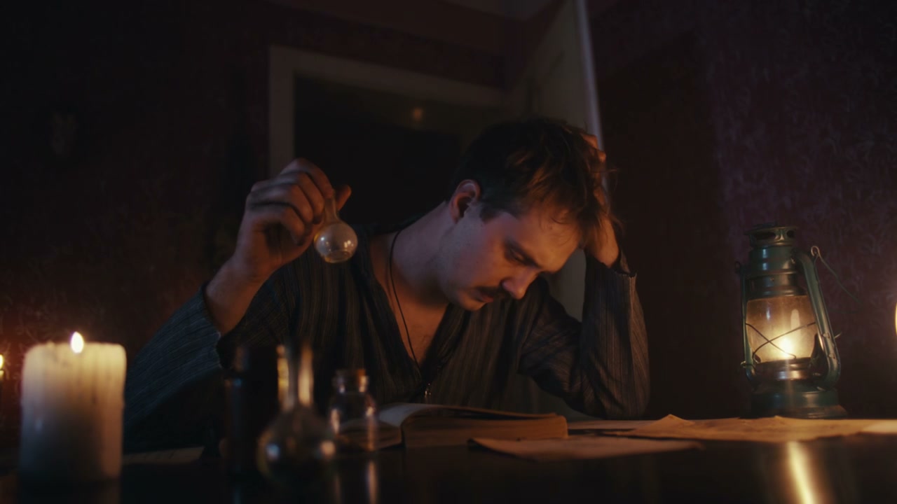 Man Performing Candlelit Ritual