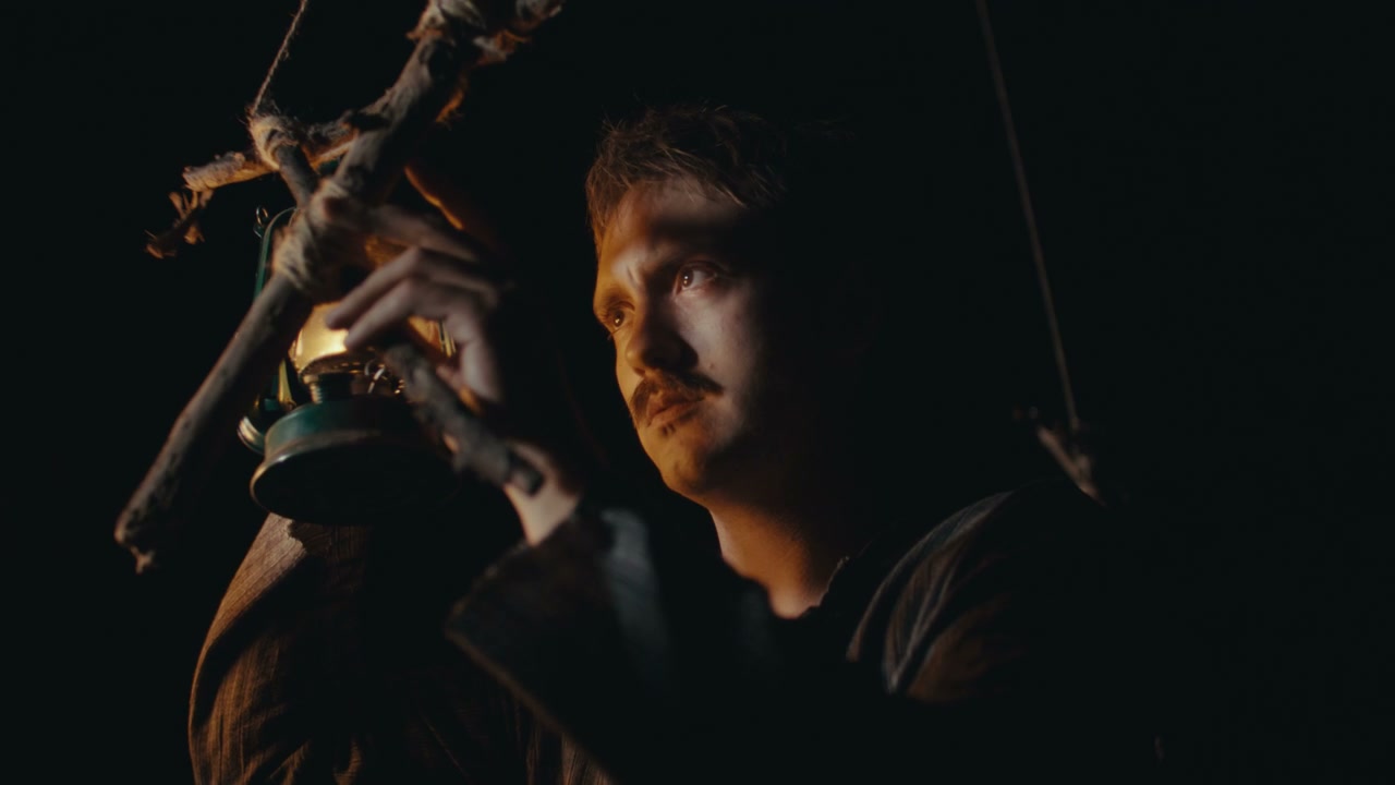 Man with a Lantern at Night