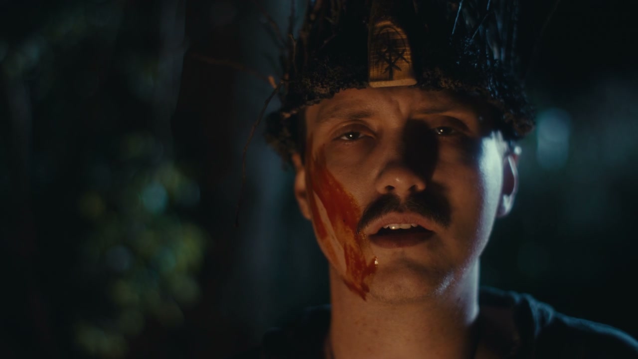Man in Ritual Crown Closing Eyes
