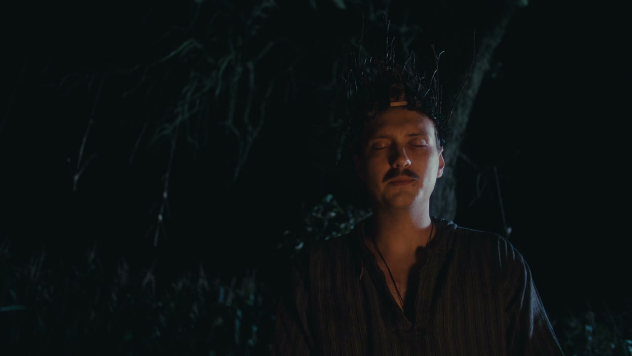 Man Chanting in Night Ritual Ceremony
