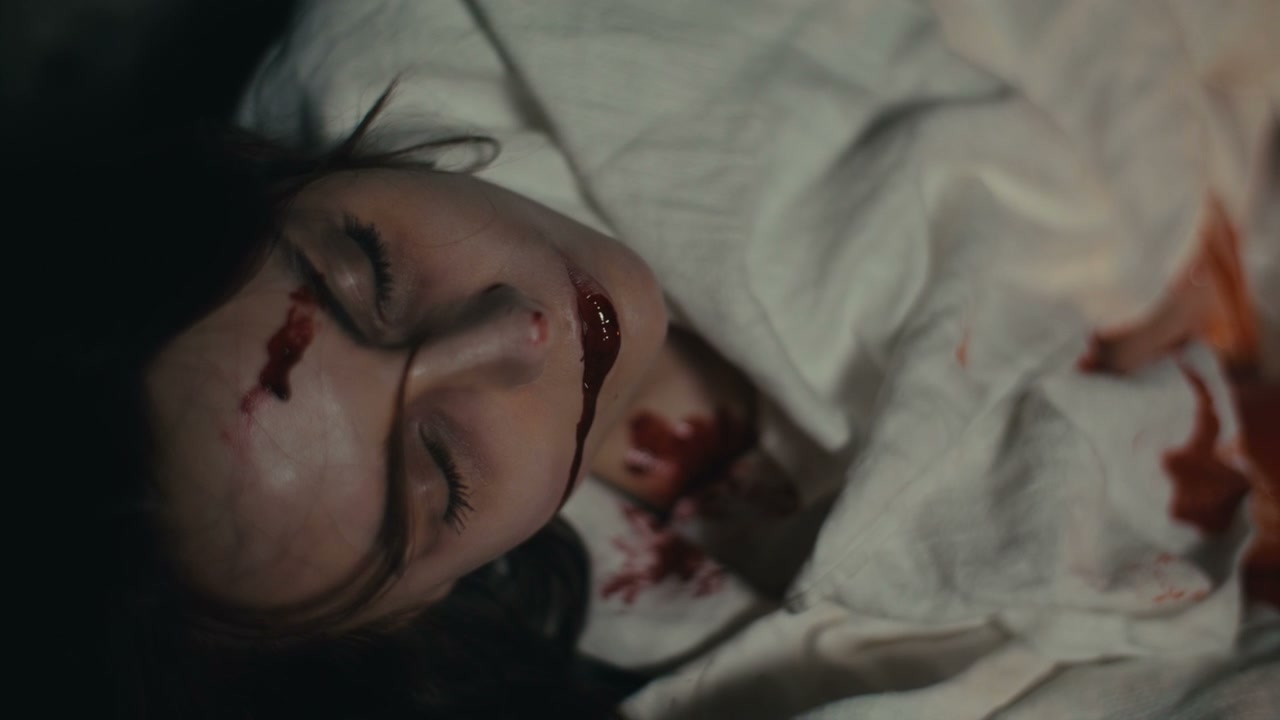 Bloodied Person Lying Still