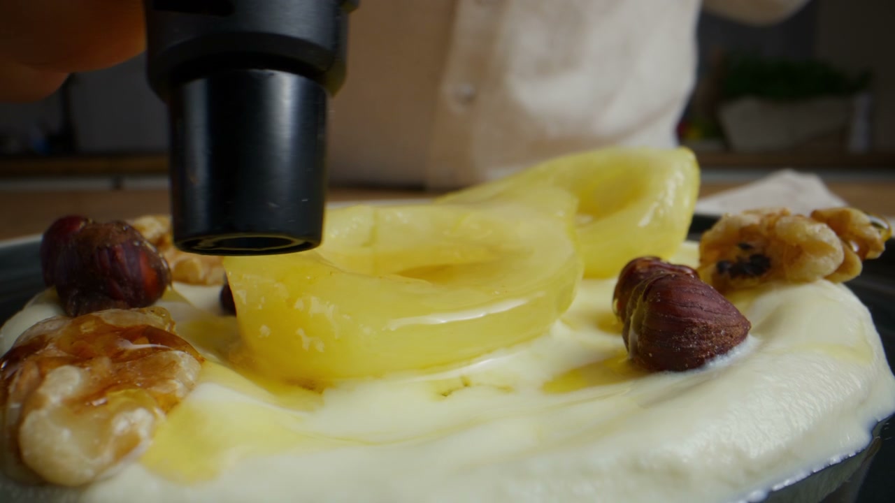 Caramelizing Nuts on Pear and Yogurt Dessert
