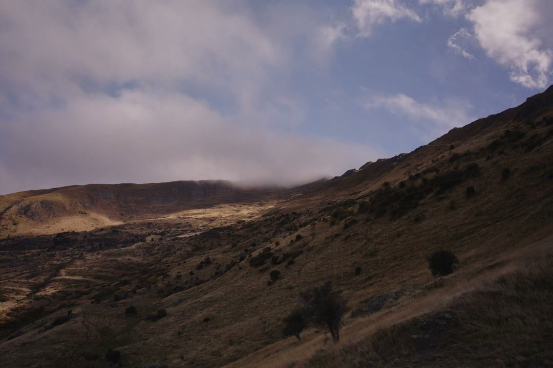 Clouds and Shadows Moving Over New Zealand Mountains
