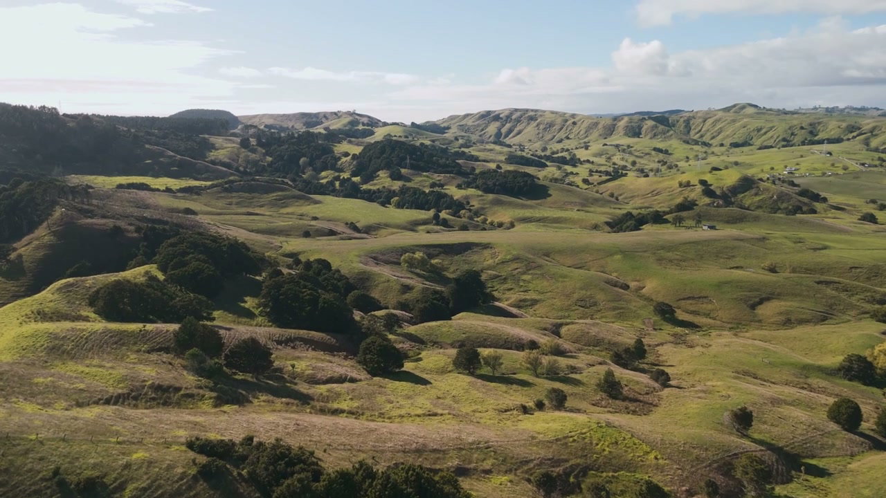 Aerial View Over Rolling Green Hills
