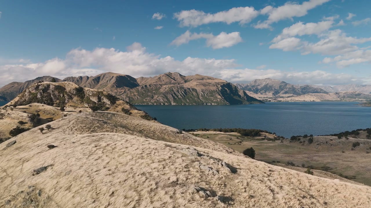 Mountain Lake Landscape with Rolling Dry Hills