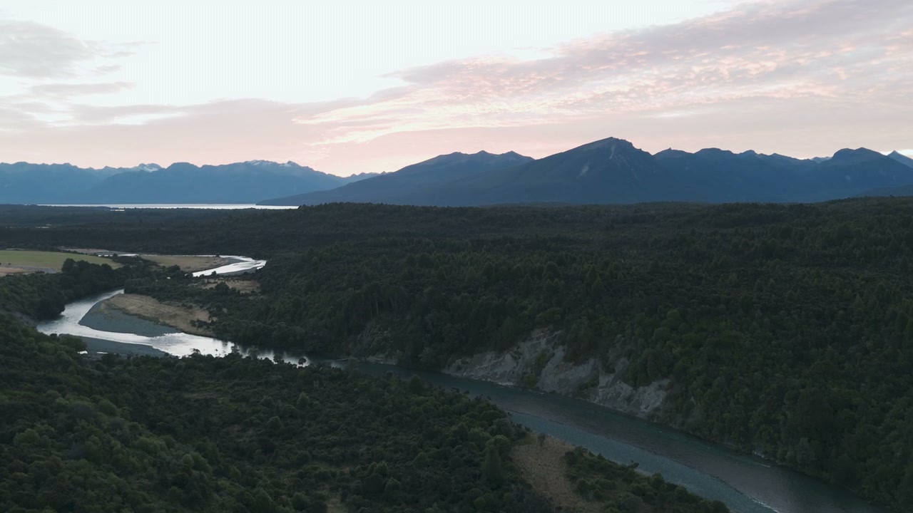 River Valley Winding Through Forest at Dawn