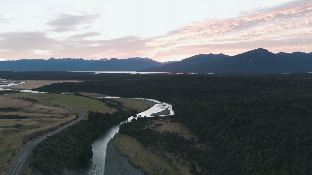 Aerial View of River Winding Through Landscape